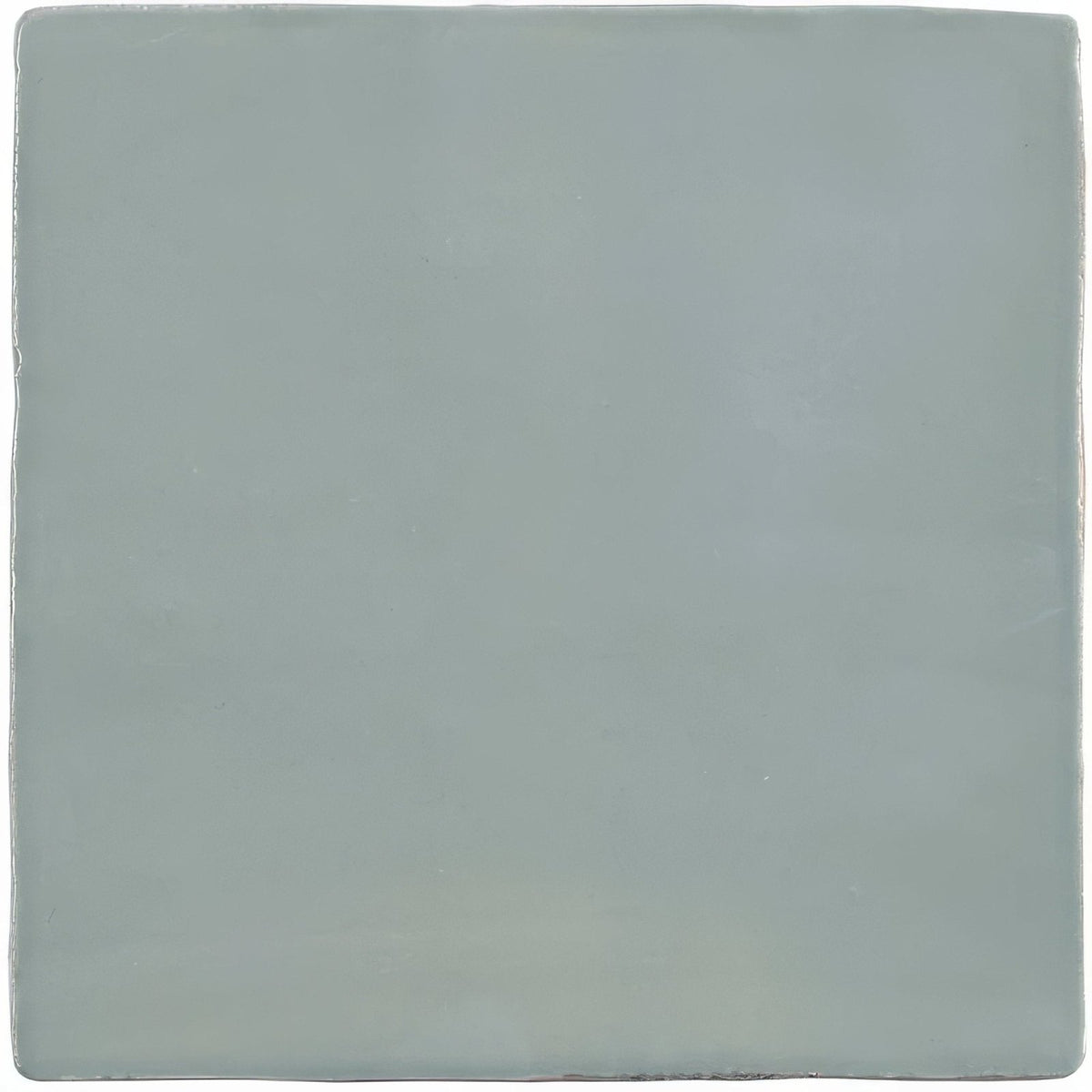 A smooth square ceramic tile with a matte sage green finish from the lazul field tile collection