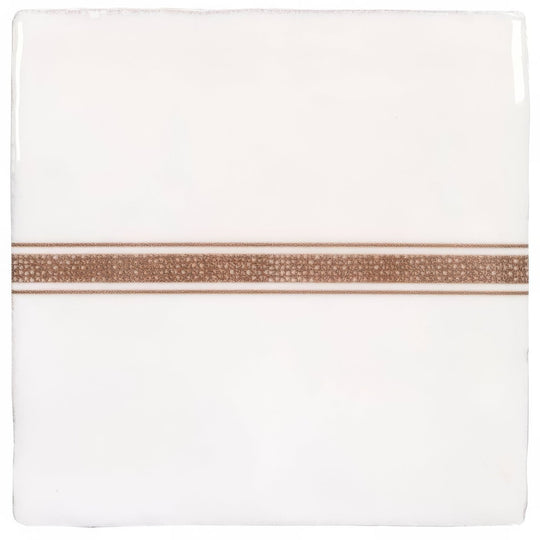 White ceramic coaster with a textured rose gold stripe across the center featuring linen border sepia on cotton design