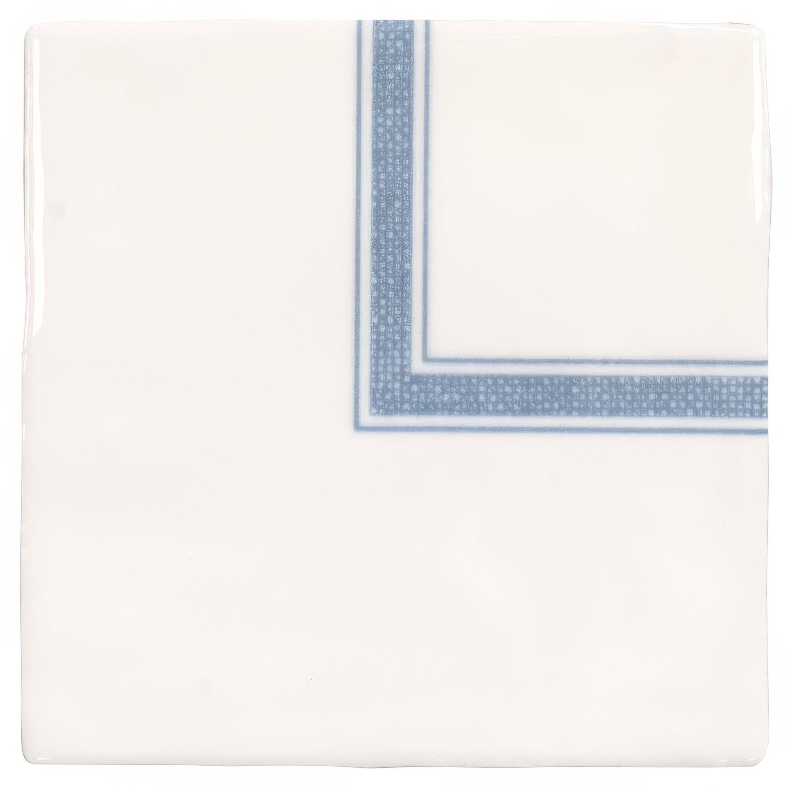 White ceramic napkin with delicate blue patterned border from Linen Corner Blue on cotton collection