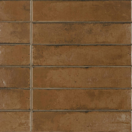 Brown rectangular lisbon terracotta shine tiles with textured earthy finish arranged in neat rows