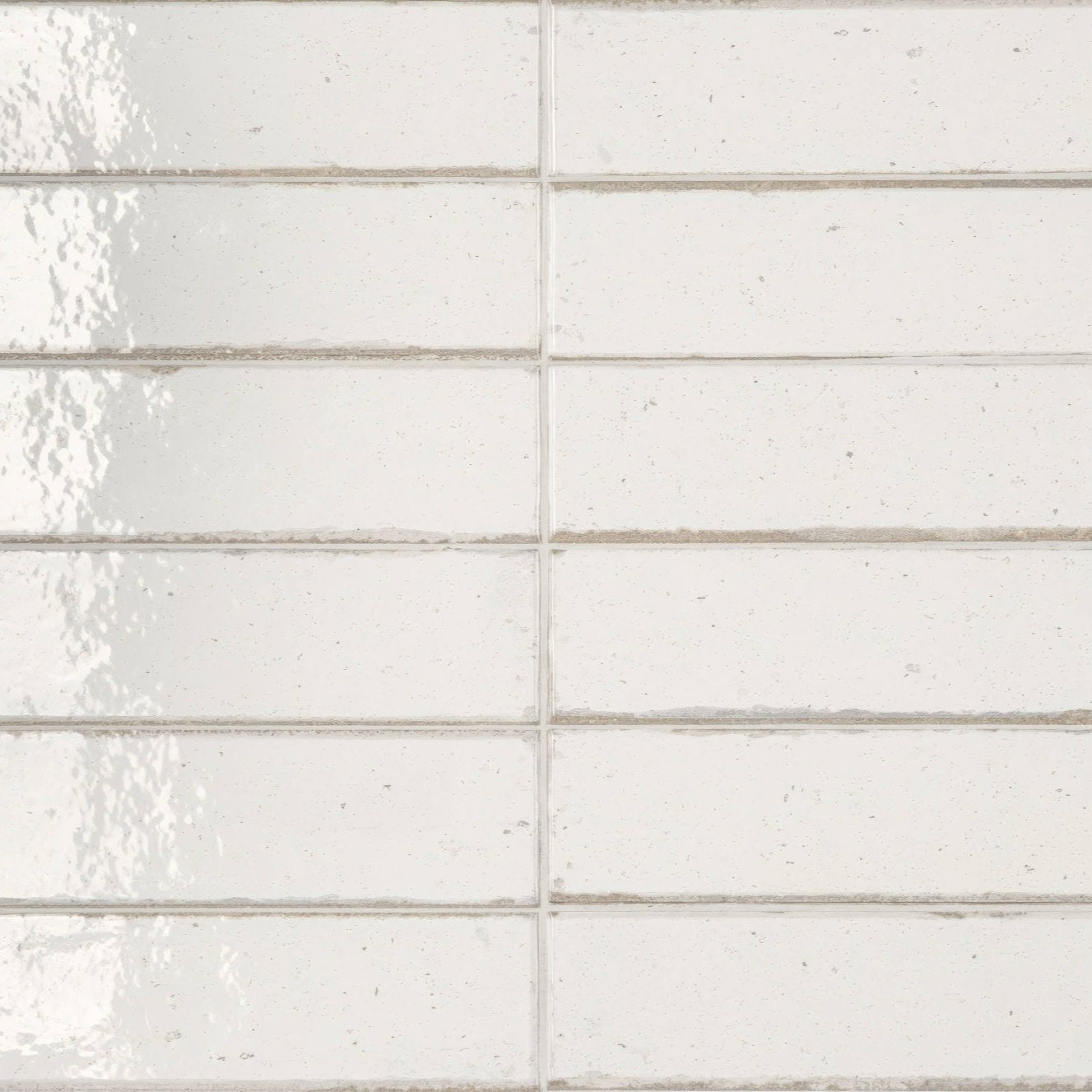 White ceramic subway tiles lisbon warm white shine with a subtle matte finish and faint speckles