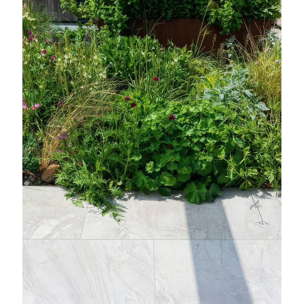 Lithos Porcelain Paving Textured Blanc light grey paving tiles