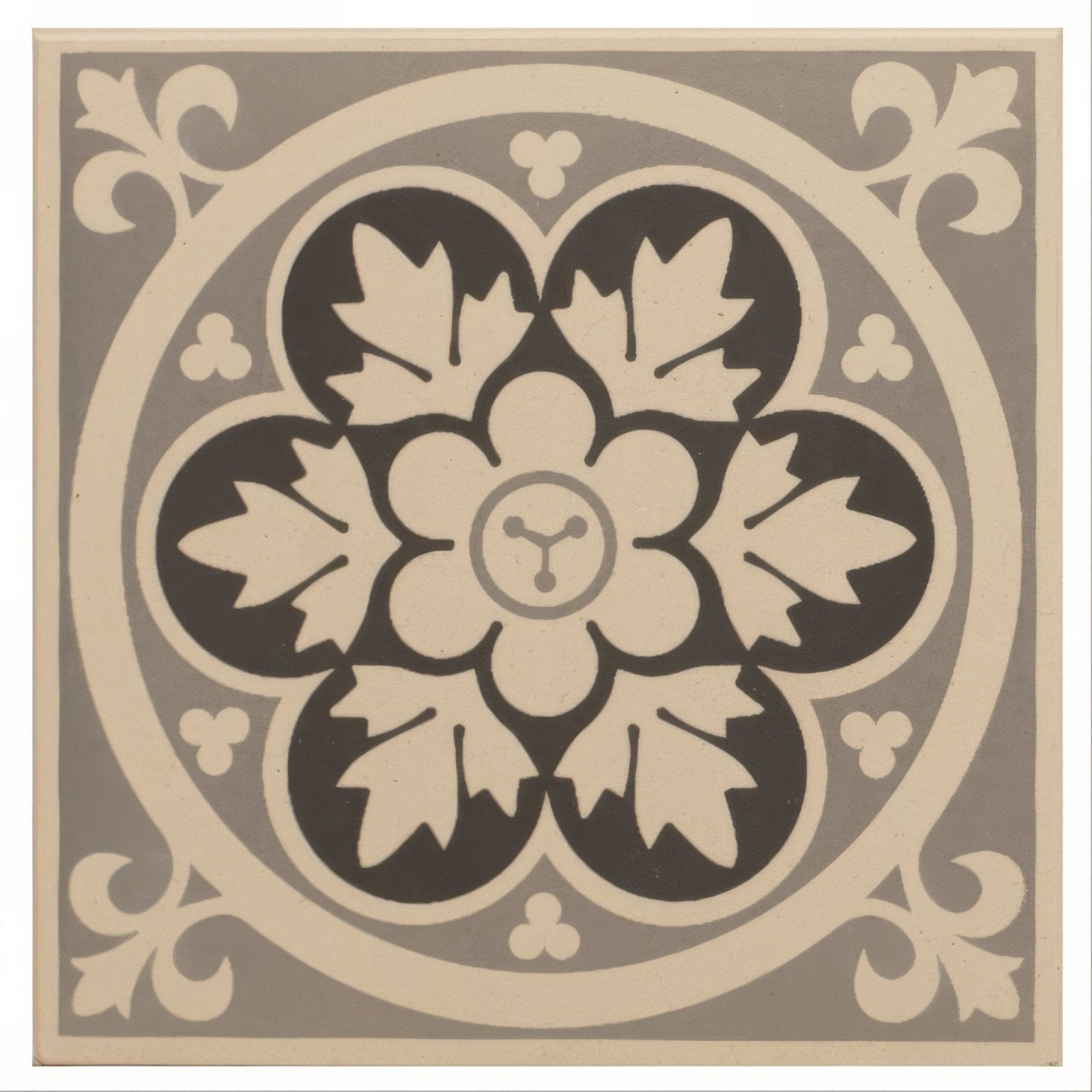 Livingstone grey on white decorative tile with gray and cream symmetrical floral pattern featuring black leaf motifs