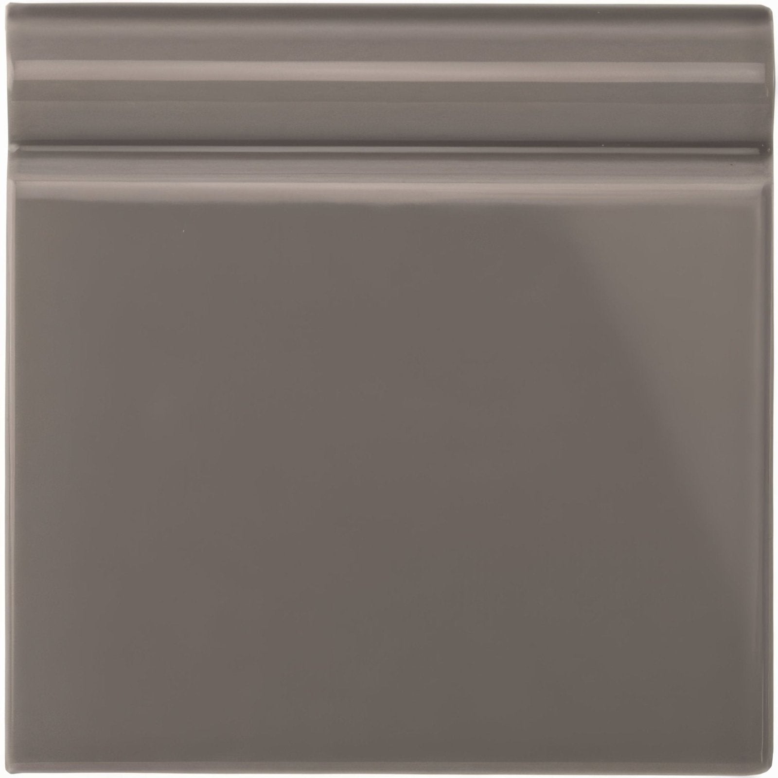 London Stone skirting tile matte gray ceramic with subtle glossy finish and raised horizontal ridges on top edge