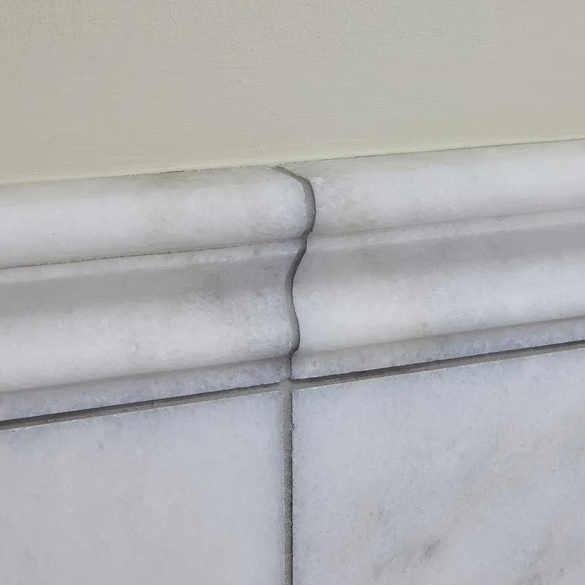 Long island marble dado honed finish white marble baseboard with subtle veining and classic multi tiered profile