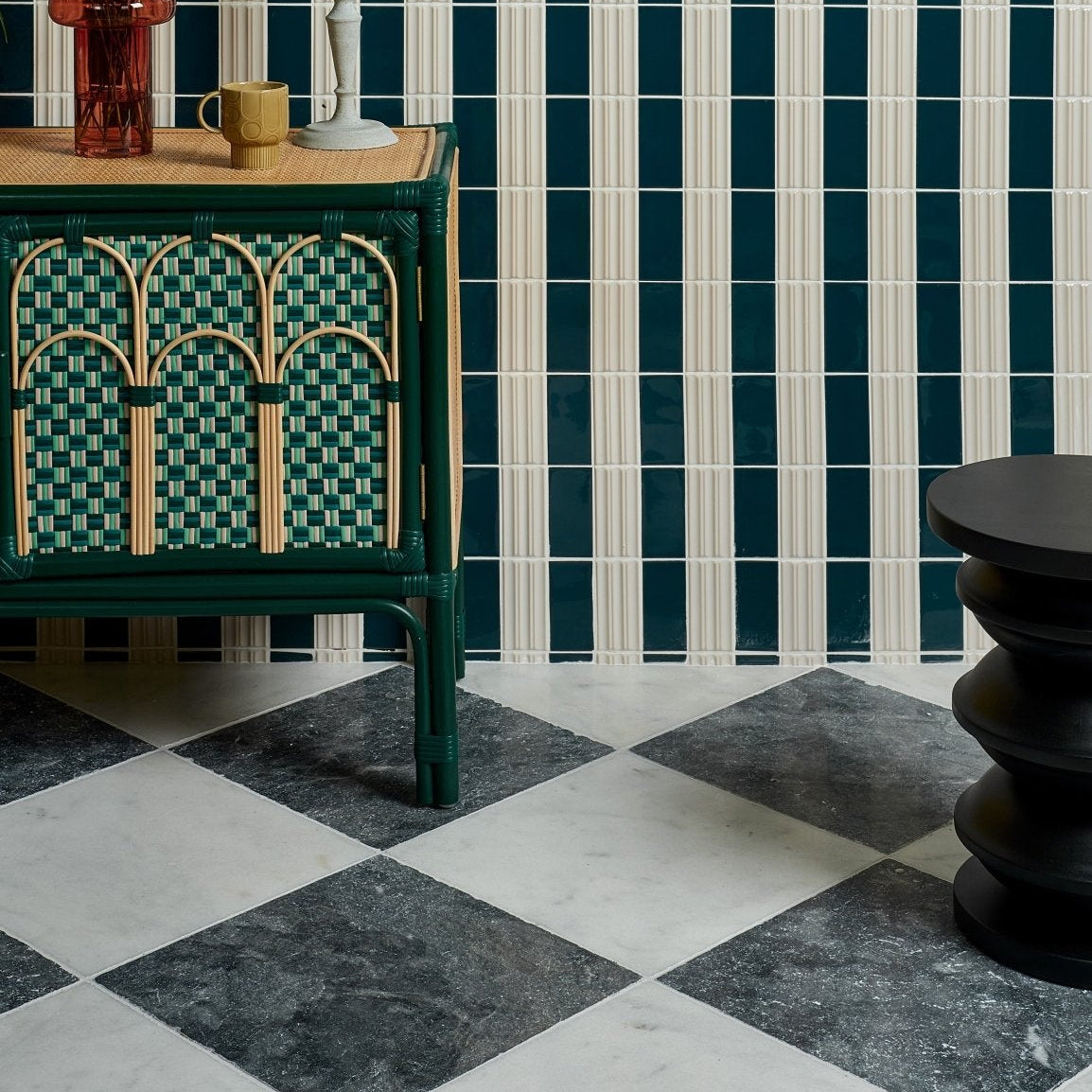 Long Island Marble Tumbled Finish 40.6 x 40.6cm white and grey marble tiles with a green rattan sideboard