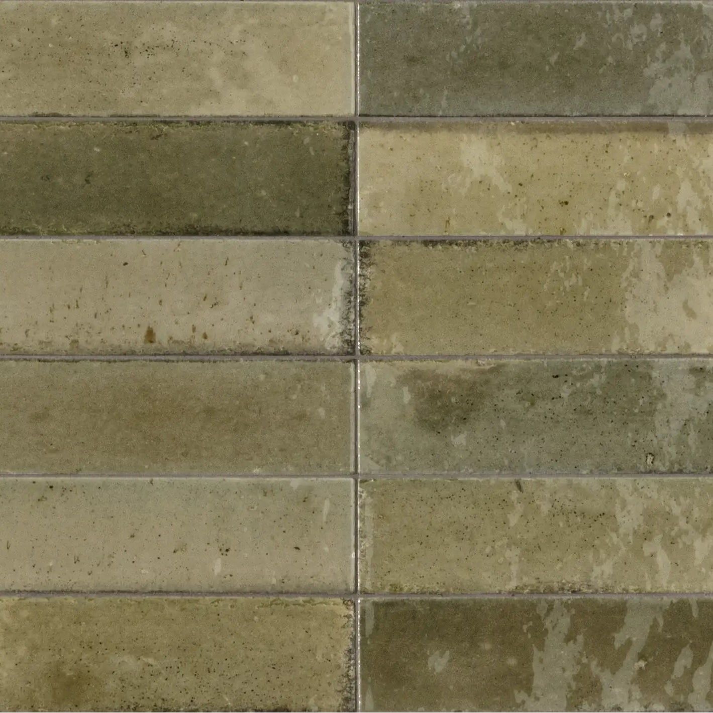 Beige and gray rectangular stone tiles with rustic textured finish from luminous lume musk collection