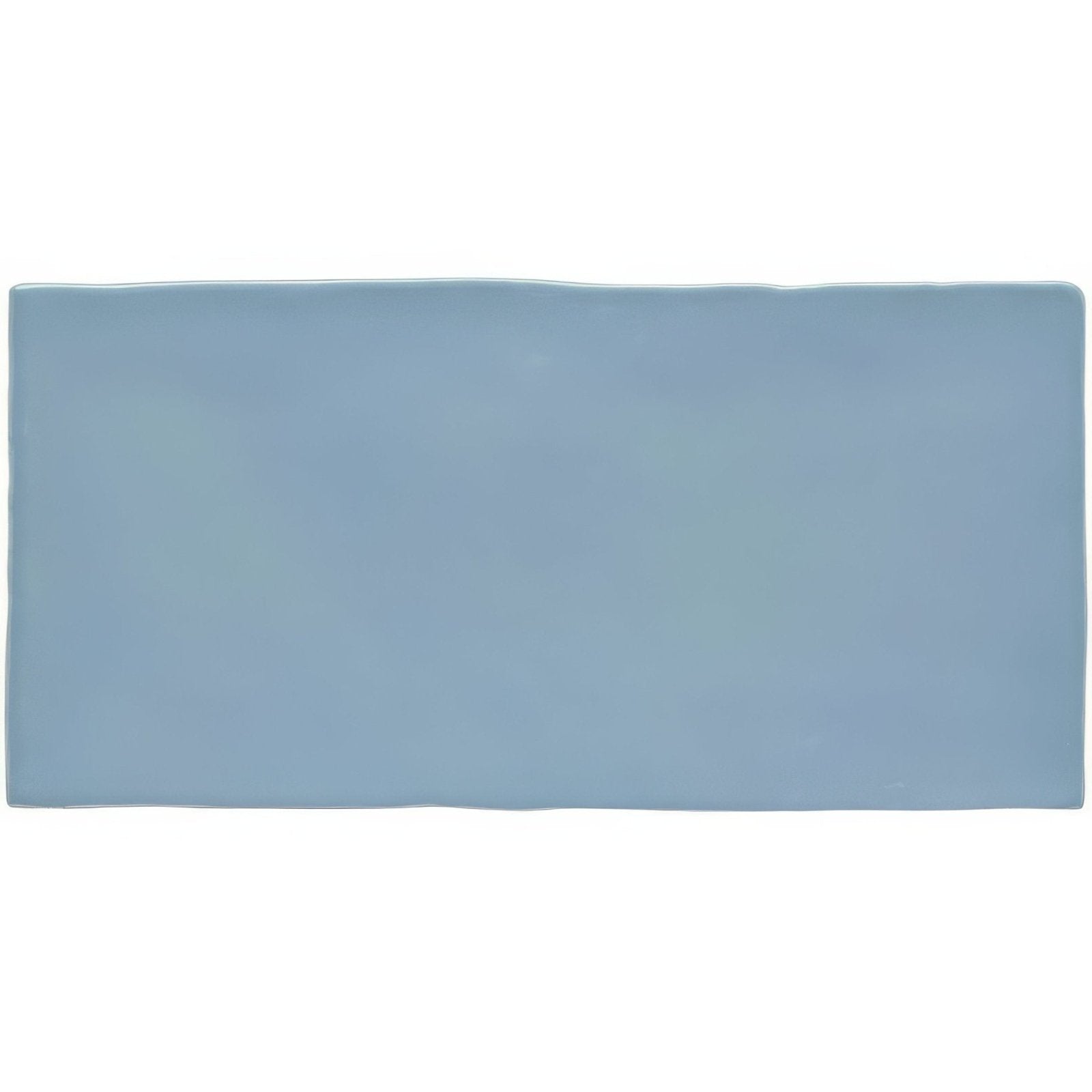 Lupin brick wall tile 20x10cm is a rectangular matte light blue ceramic tile with slightly uneven edges