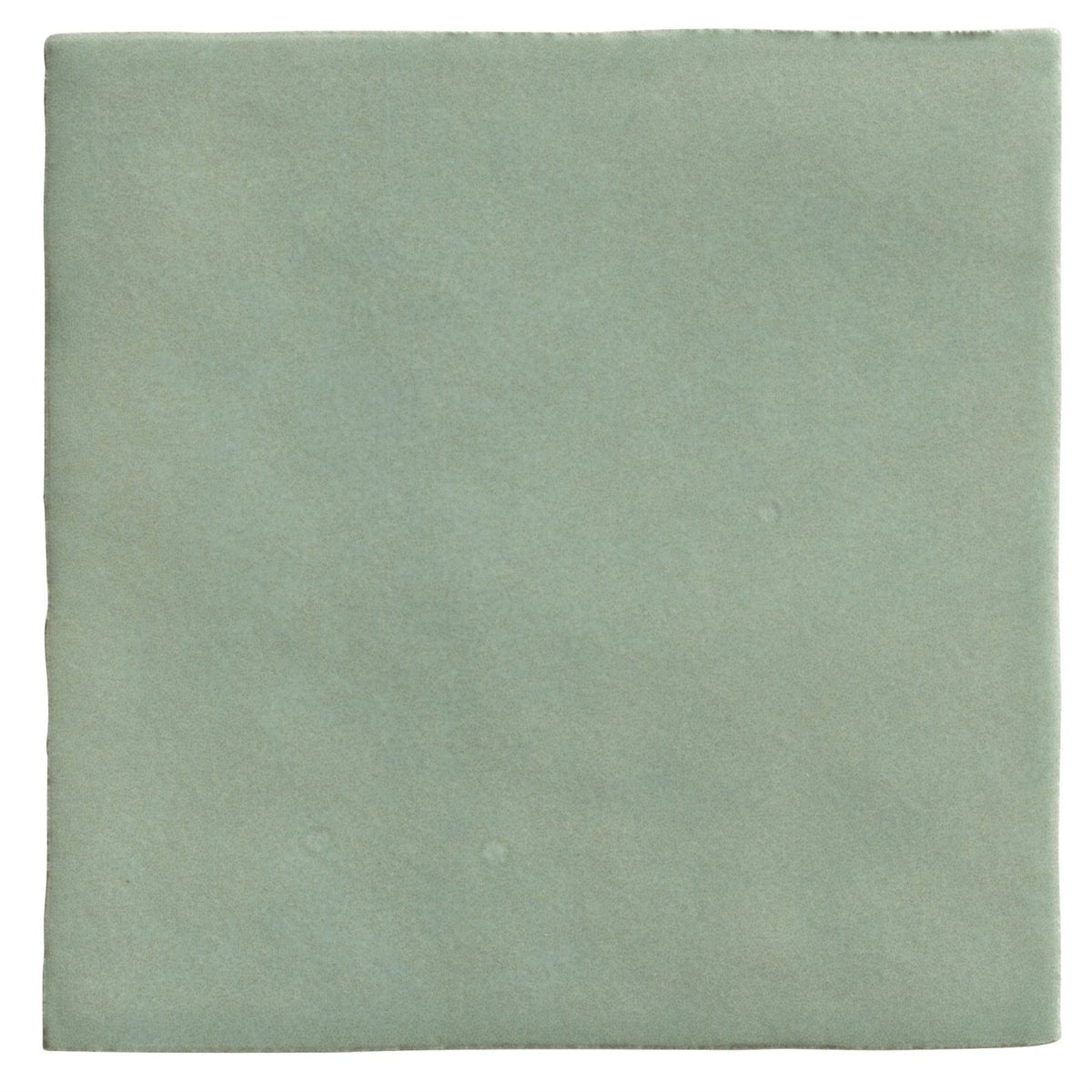 A square matte-finished ceramic tile in soft sage green from Maroc Ceramic Mint collection