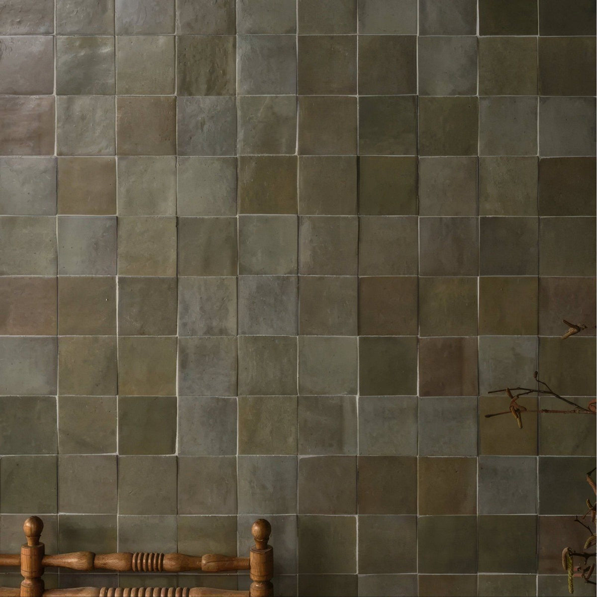 Maroc ceramic sage earthy-toned square ceramic tiles in muted green and gray hues arranged in a uniform grid