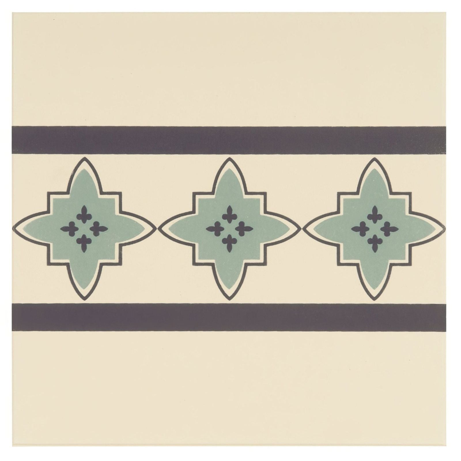 Beige ceramic tile with a central band of three light green star-shaped medallions in dark gray and black accents