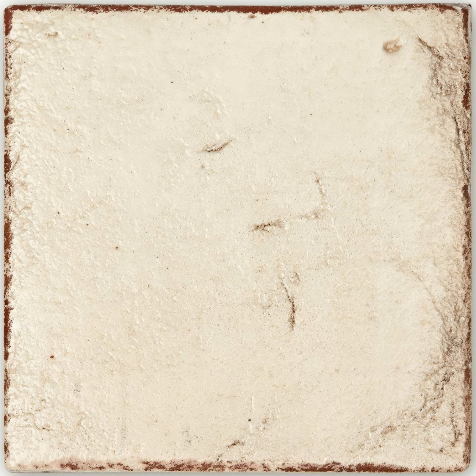 Cream-colored textured ceramic tile with rustic distressed edges Marrakech Cream Terracotta Base Tile 17cm