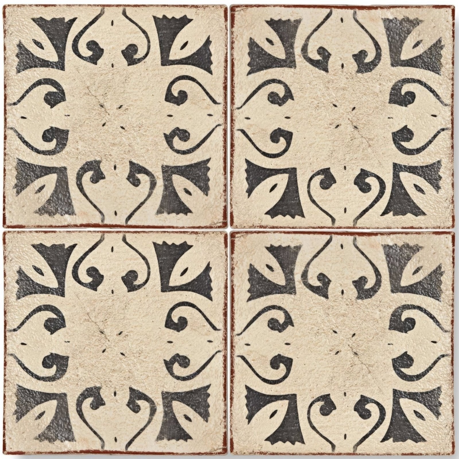 Four square beige terracotta tiles with black ornate hammam patterns and rustic edges from marrakech collection