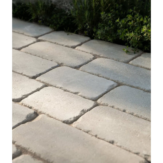 Light gray rectangular matravers sandstone tumbled cobbles with textured surface and slightly uneven edges