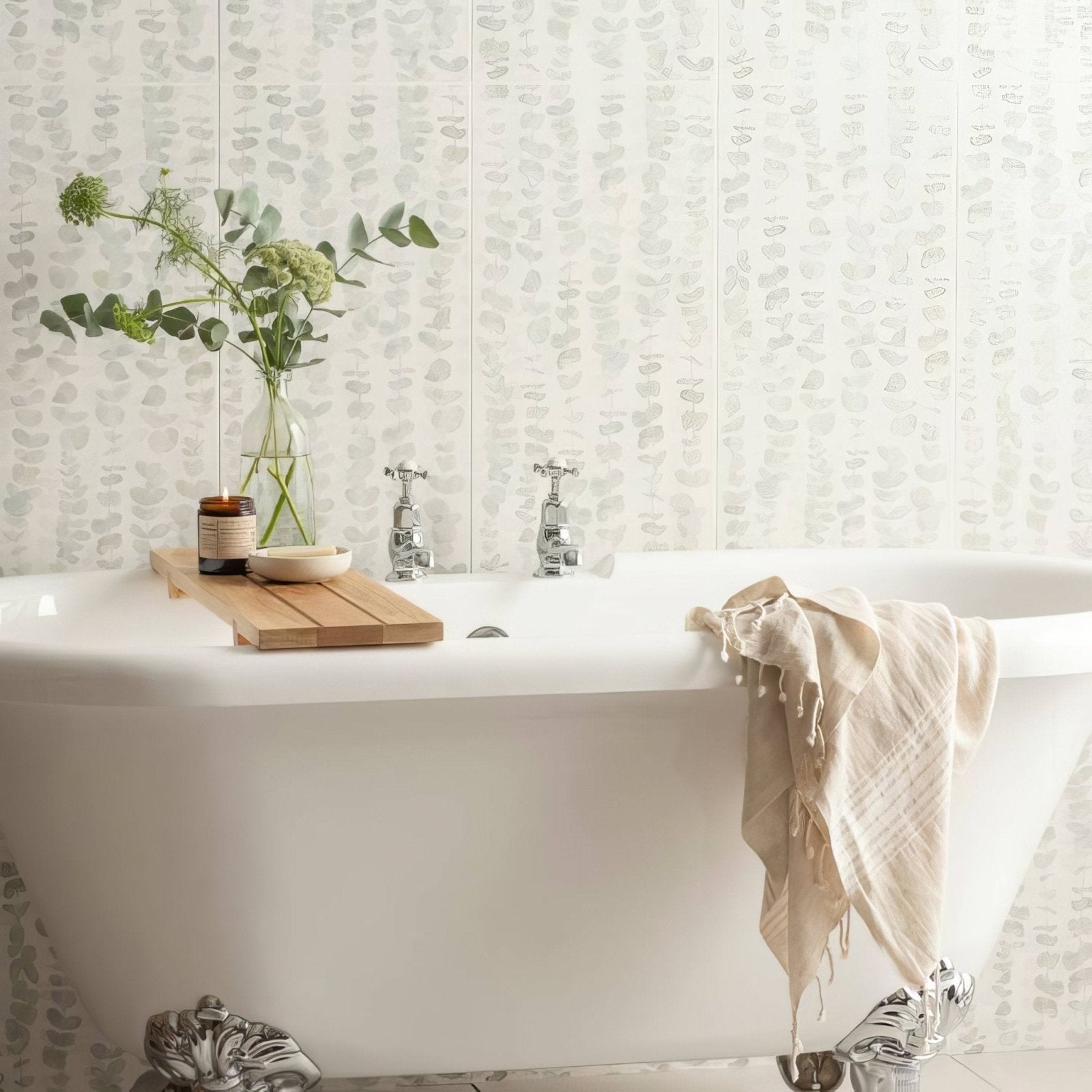 White clawfoot bathtub with chrome fixtures and beige towel featuring meadow eucalyptus design 60x30cm