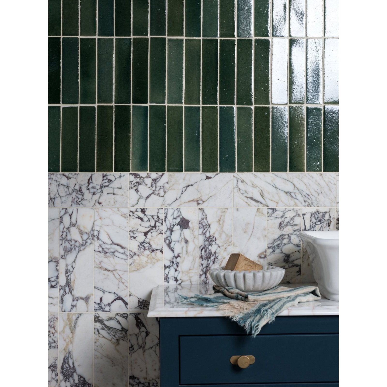 Dark green glossy ceramic rectangular tiles on upper wall section for medici viola marble honed brick design
