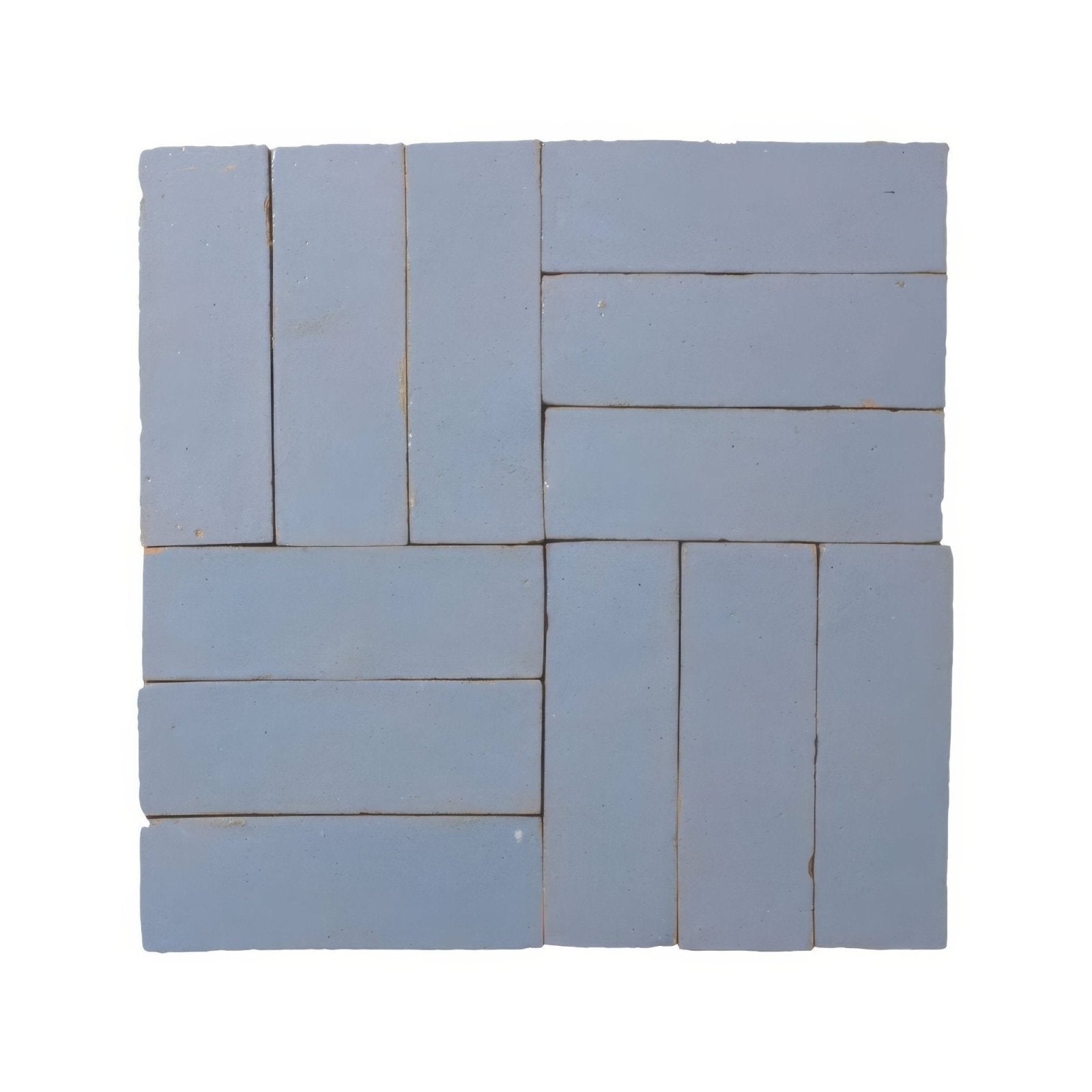 Set of light blue rectangular ceramic tiles arranged in a herringbone pattern medina cornflower blue zellige rectangle