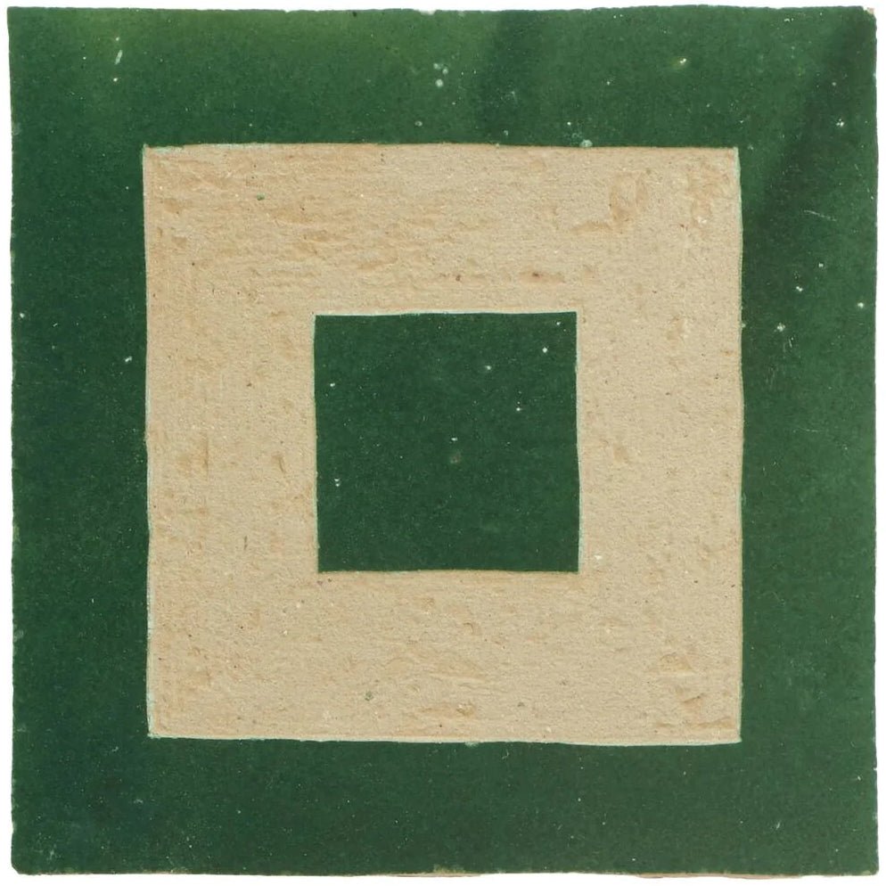 A square ceramic tile with a textured matte finish featuring concentric squares in deep green and beige medina moss green porton handmade moroccan zellige tile