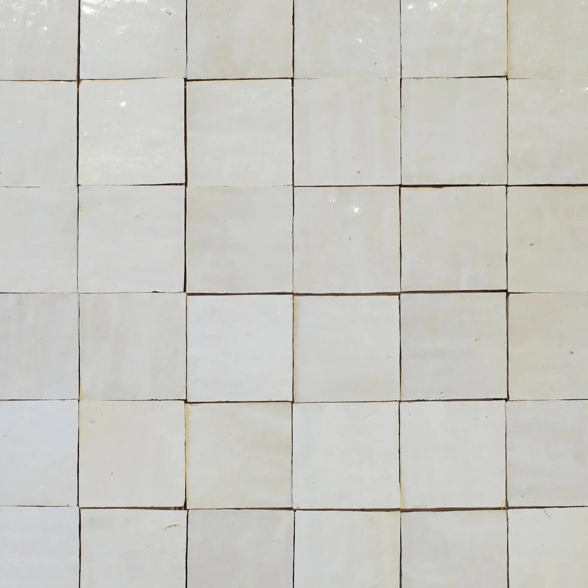 Medina pure white square handmade moroccan zellige tile with subtle glossy finish and faint grout lines