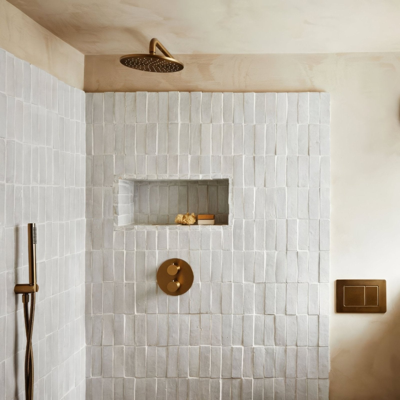 Medina pure white zellige rectangle gold-toned rain showerhead with circular perforated design mounted on ceiling