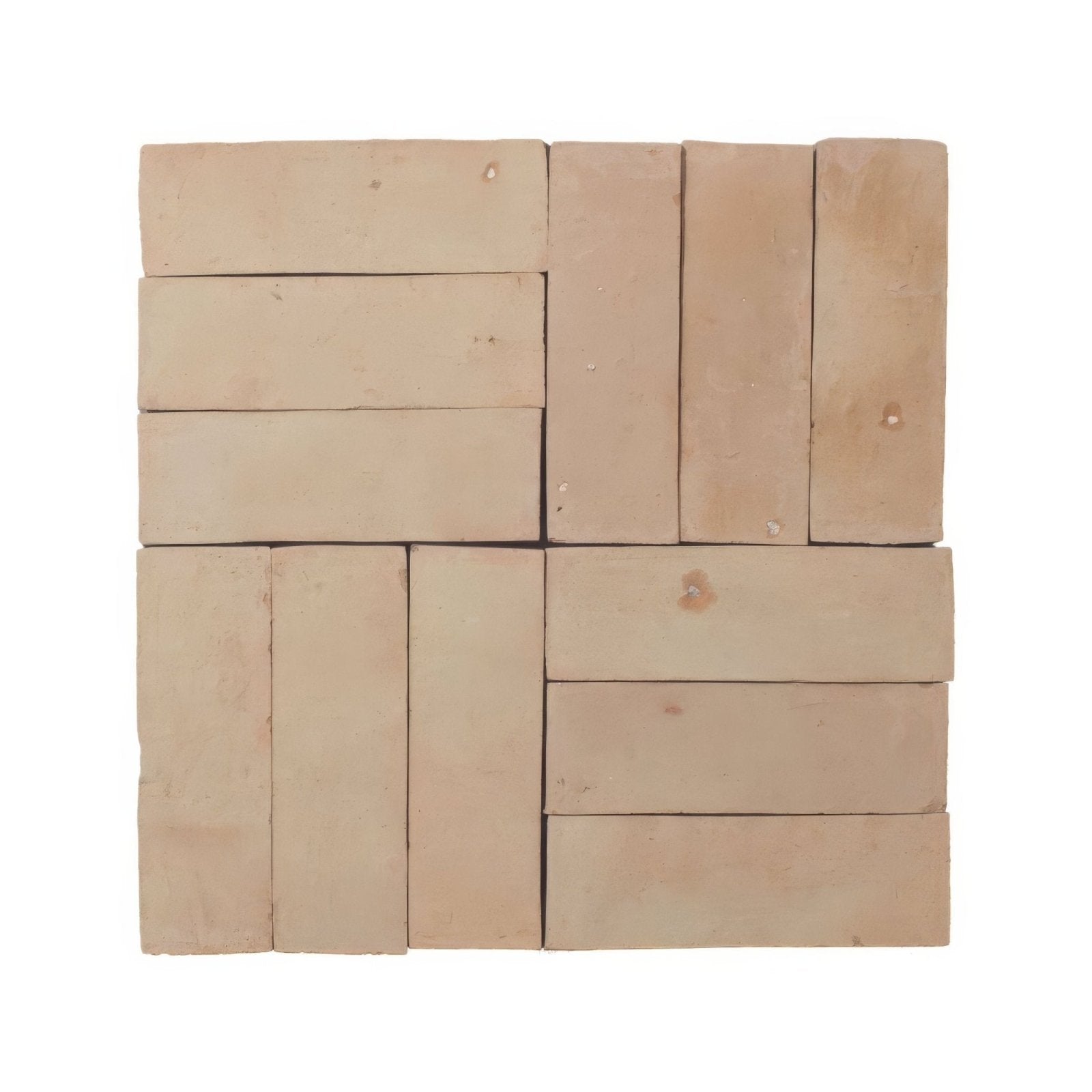 Beige terracotta medina raw zellige rectangle tiles arranged in a staggered pattern with natural imperfections