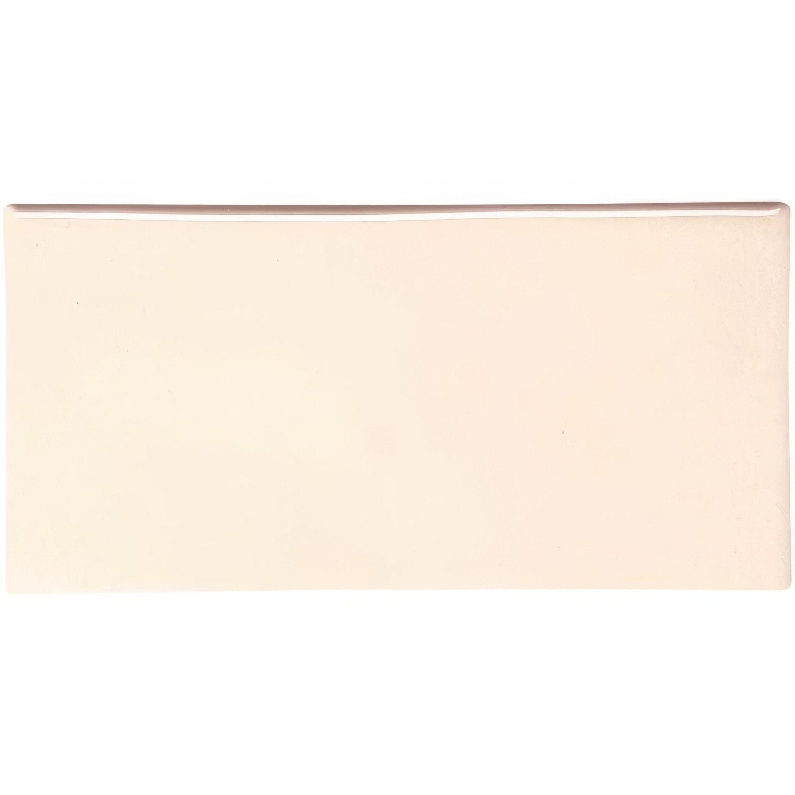 Cream-colored rectangular ceramic melford half tile with smooth glossy finish for wall and backsplash use
