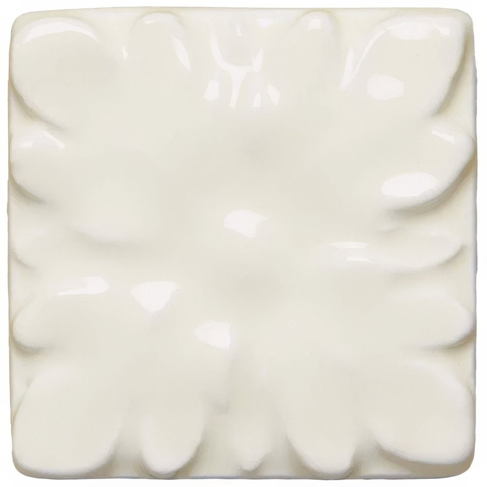 Cream-colored ceramic tile melford knightsbridge with raised flower-like relief pattern for decorative use