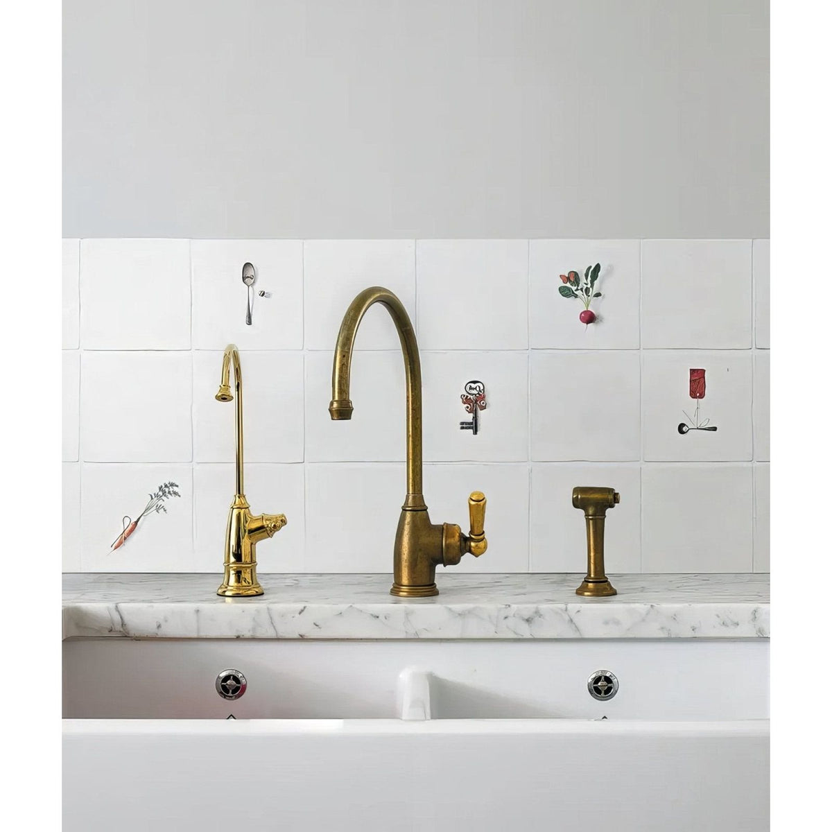 Antique brass kitchen faucet with curved spout and ornate handle from menagerie ceramic by michael angove