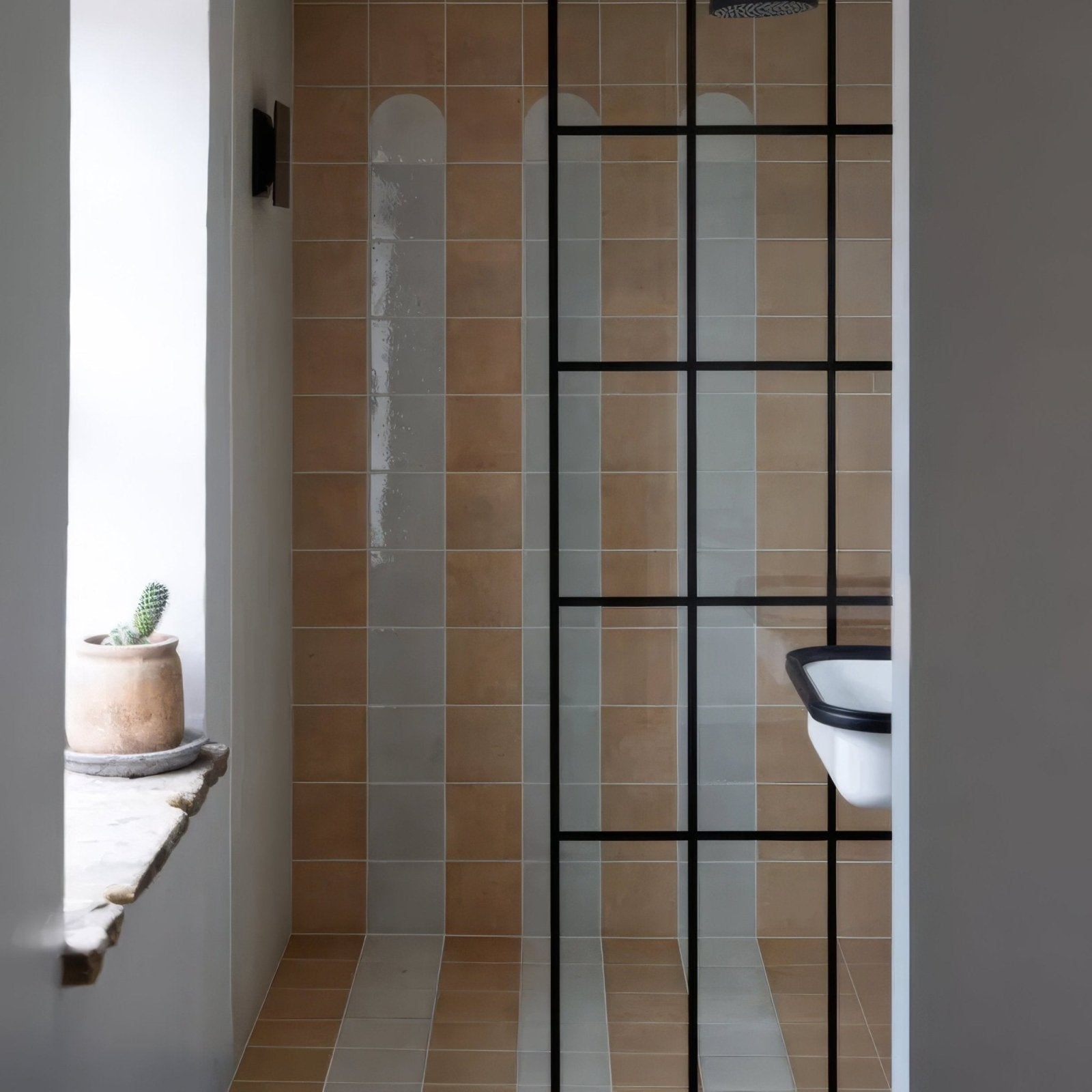 Menara white arches porcelain shower stall with modern beige and gray striped tiles framed by black metal grid lines