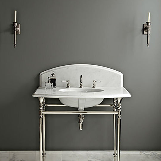 White marble Mercury bathroom sink with polished chrome faucet and ornate legs for elegant bathroom decor