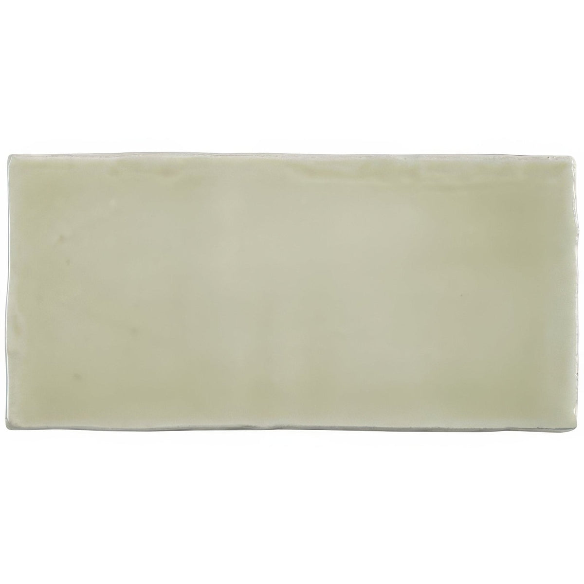 Cream-colored ceramic mere half tile wall tile with smooth glossy finish and rectangular shape for wall use