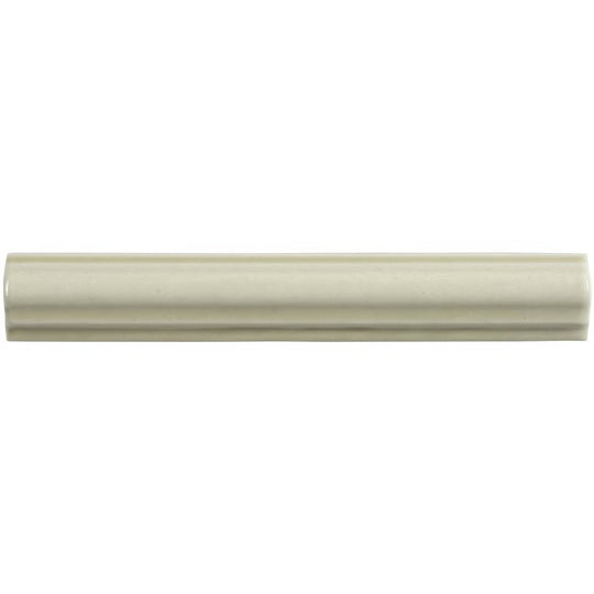 Cream-colored ceramic mere ogee moulding tile with smooth glossy finish and subtle horizontal ridges along its length