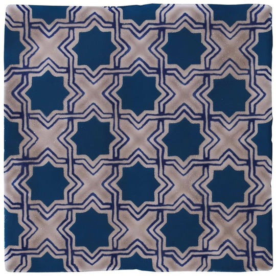 Merles on truffle tile with blue and beige geometric star-shaped patterns for decorative flooring and walls