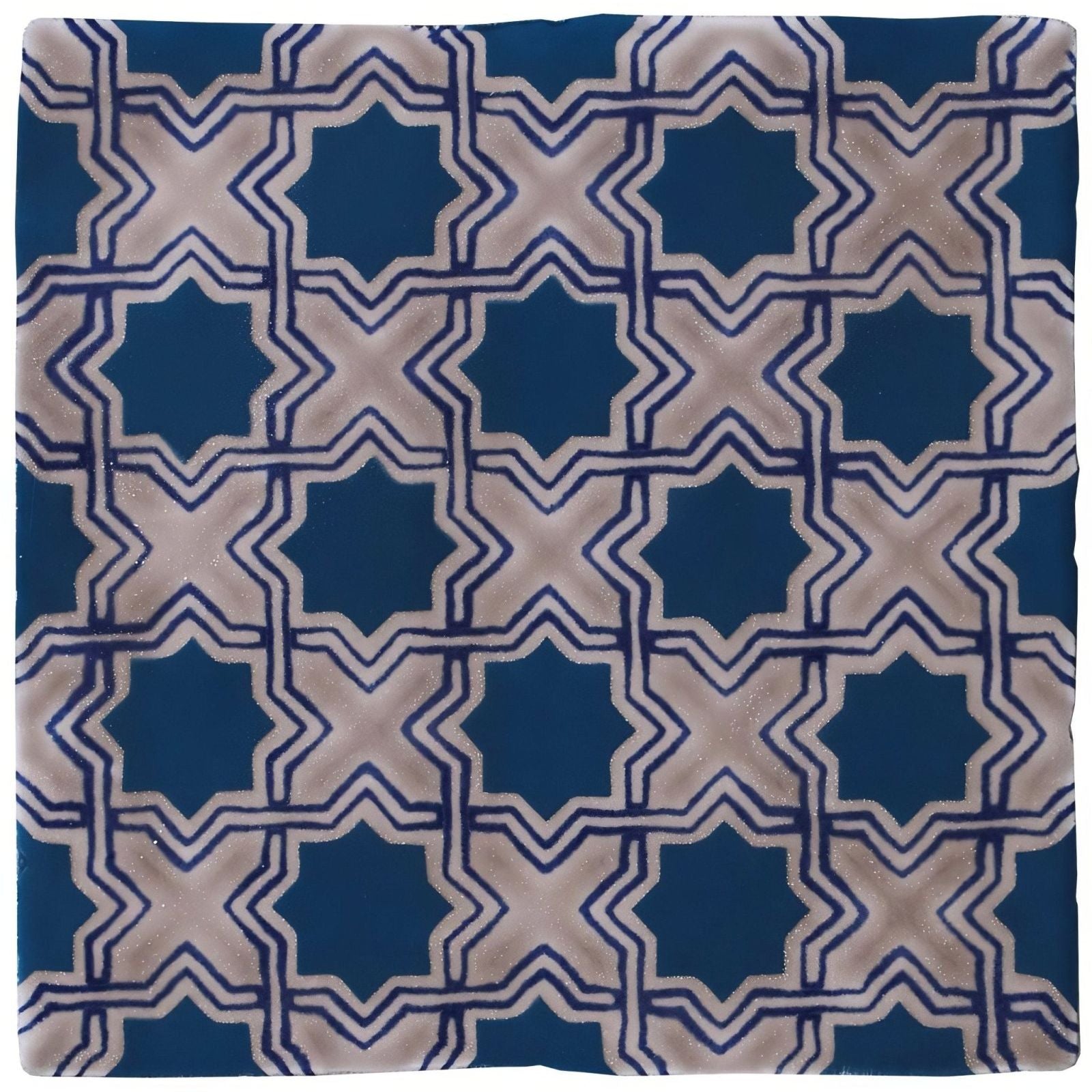 Merles on truffle tile with blue and beige geometric star-shaped patterns for decorative flooring and walls