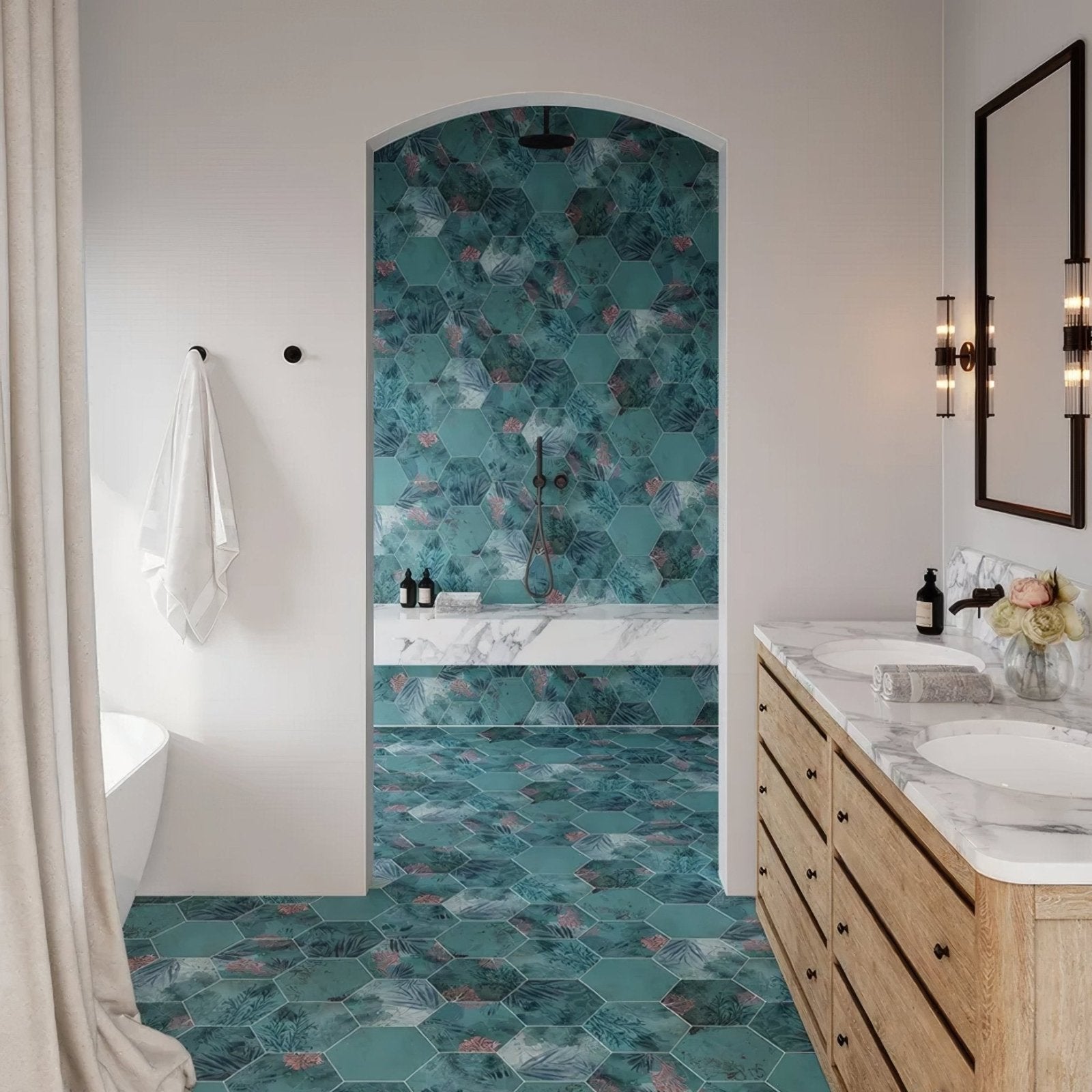 Teal hexagonal porcelain tiles with tropical leaf and pink floral patterns covering shower wall and floor mermaids garden