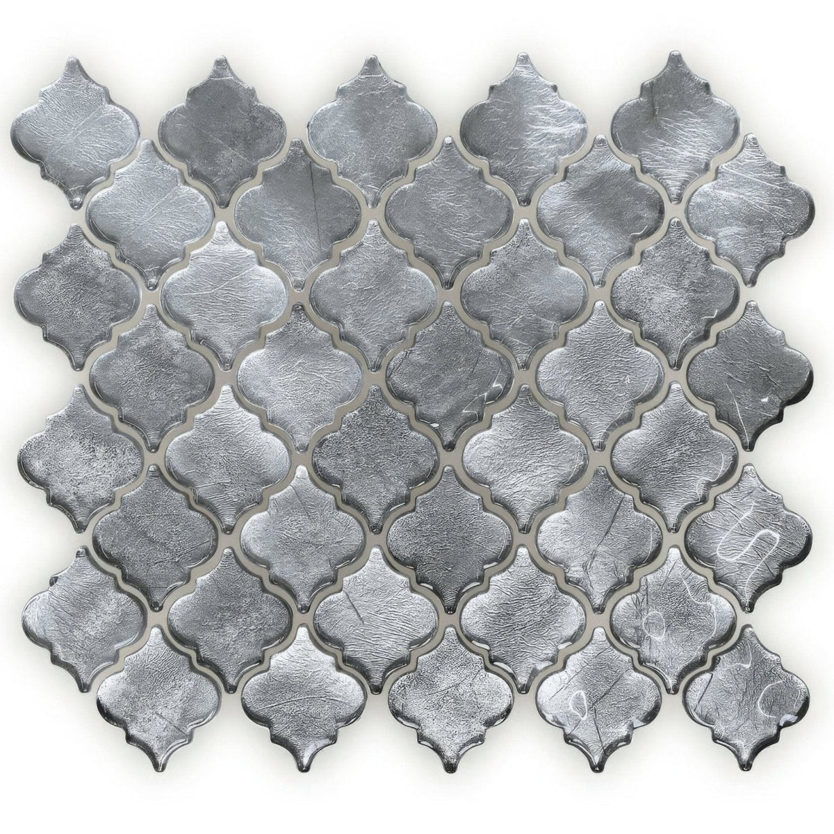 Silver metallic quatrefoil mosaic tile with textured reflective surface in metallic vitreum argentum arabesque glass design