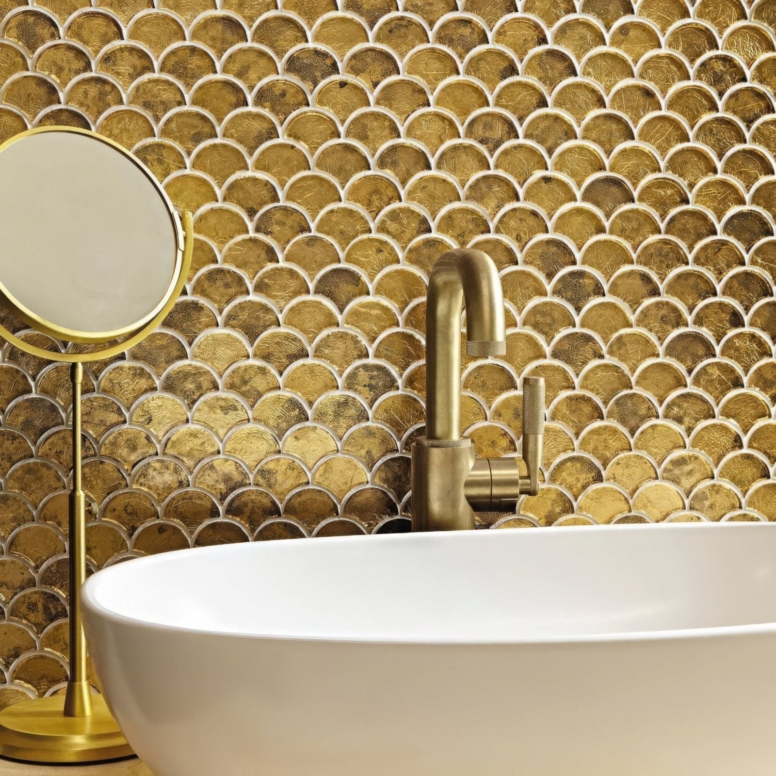 Gold-toned fish-scale metallic vitreum aurum fan gold glass tile backsplash with shimmering mosaic pattern