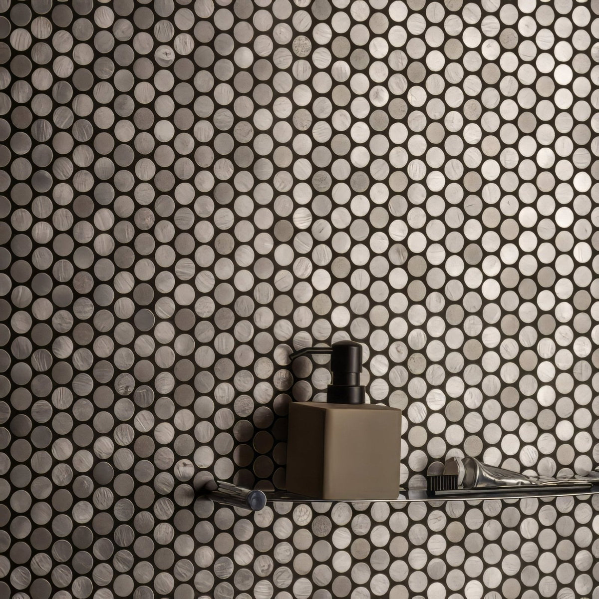 Methone Silver Mixed Finish Penny Round silver penny round mosaic with a taupe soap dispenser