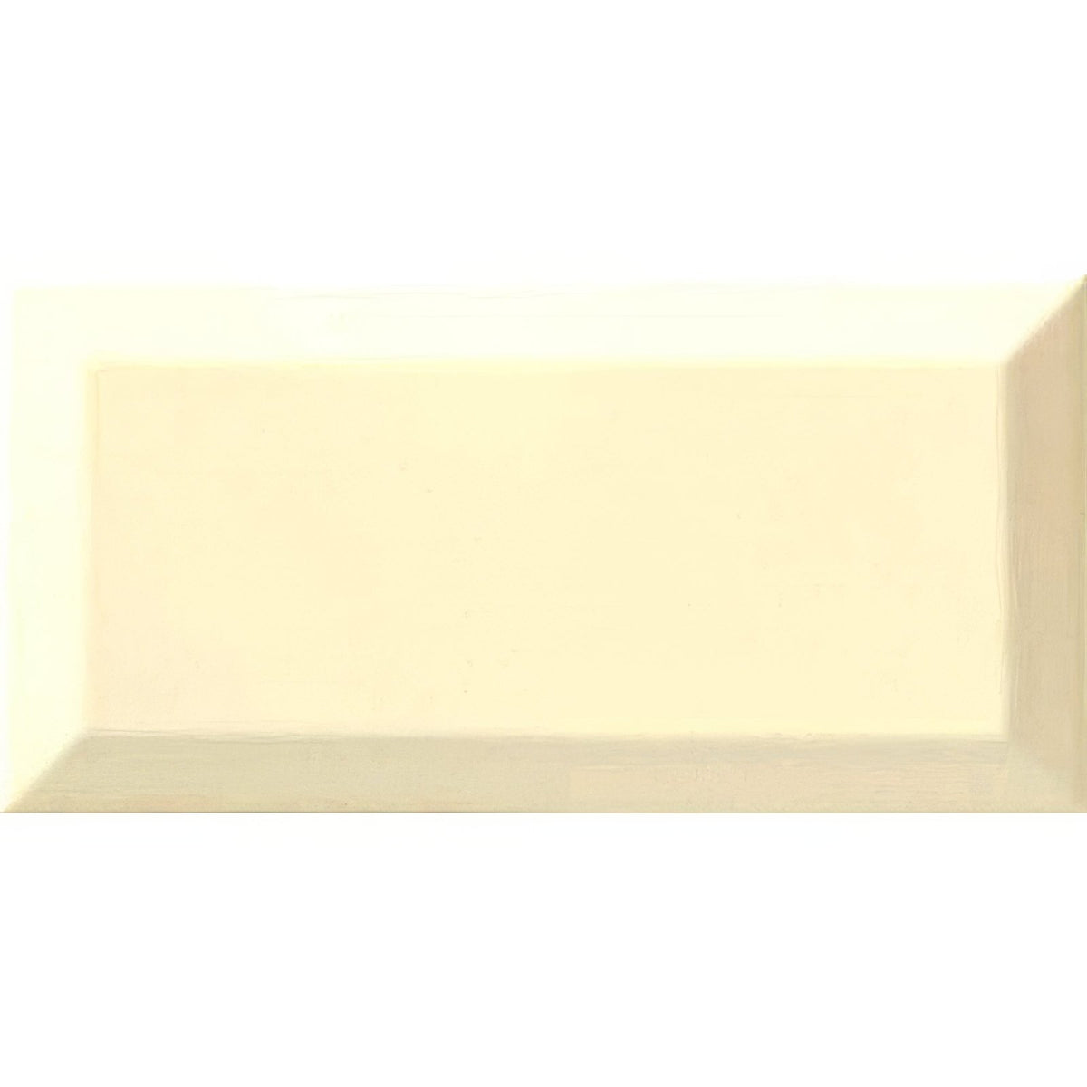 Cream-colored metro bone ceramic gloss tile with subtle glossy finish and raised edges rectangular shape