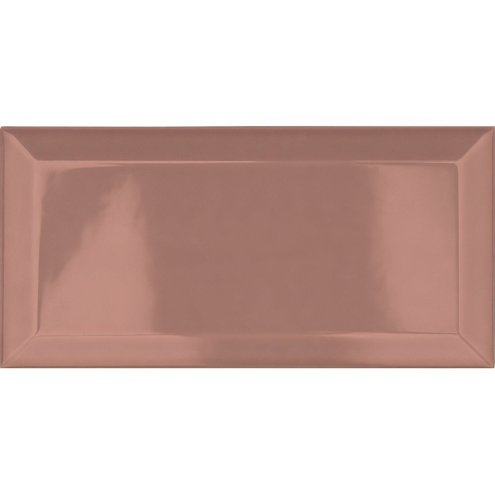 A rectangular glossy rose gold ceramic tile with a raised border from metro pink ceramic gloss collection