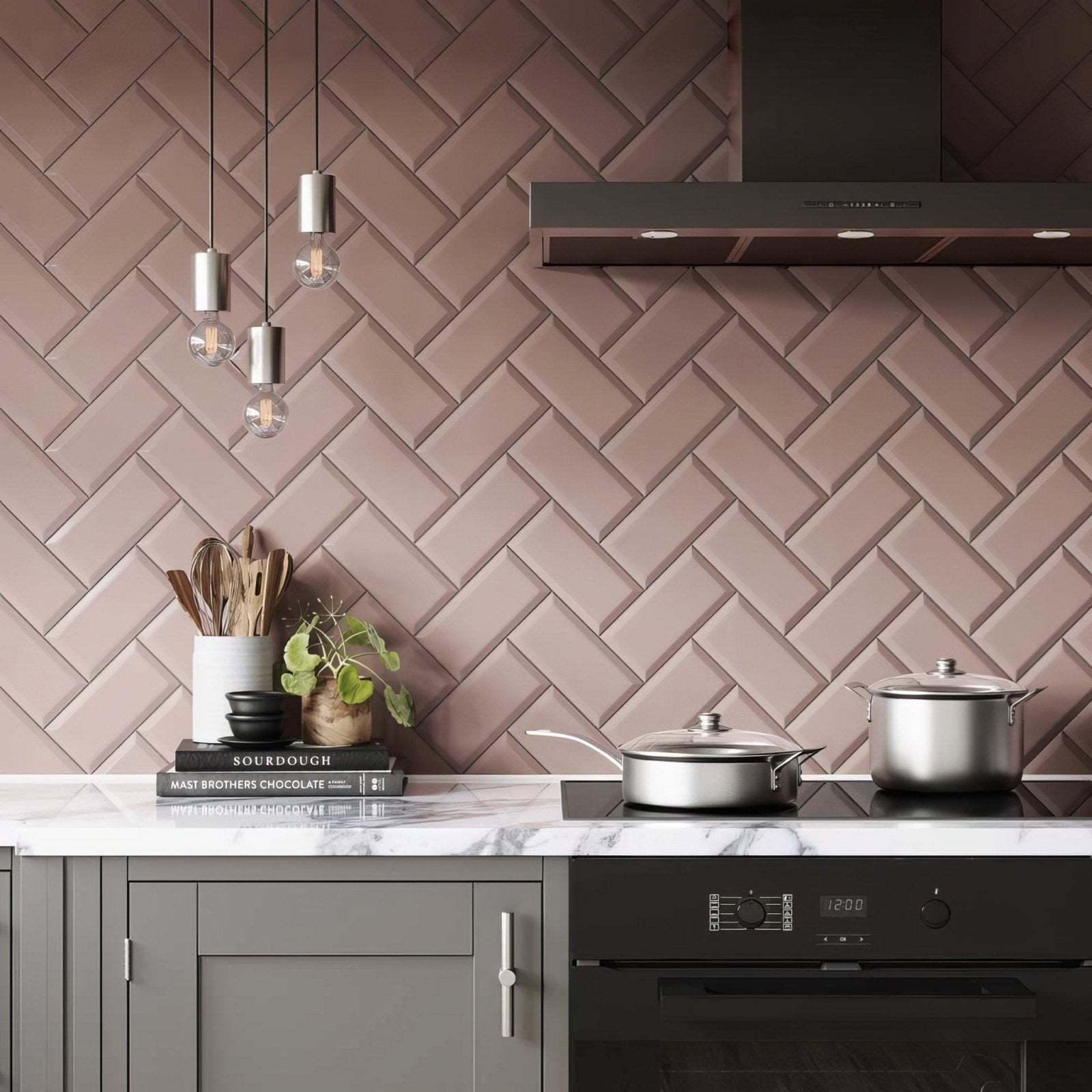 A modern kitchen backsplash featuring metro pink ceramic gloss matte finish tiles in a herringbone pattern