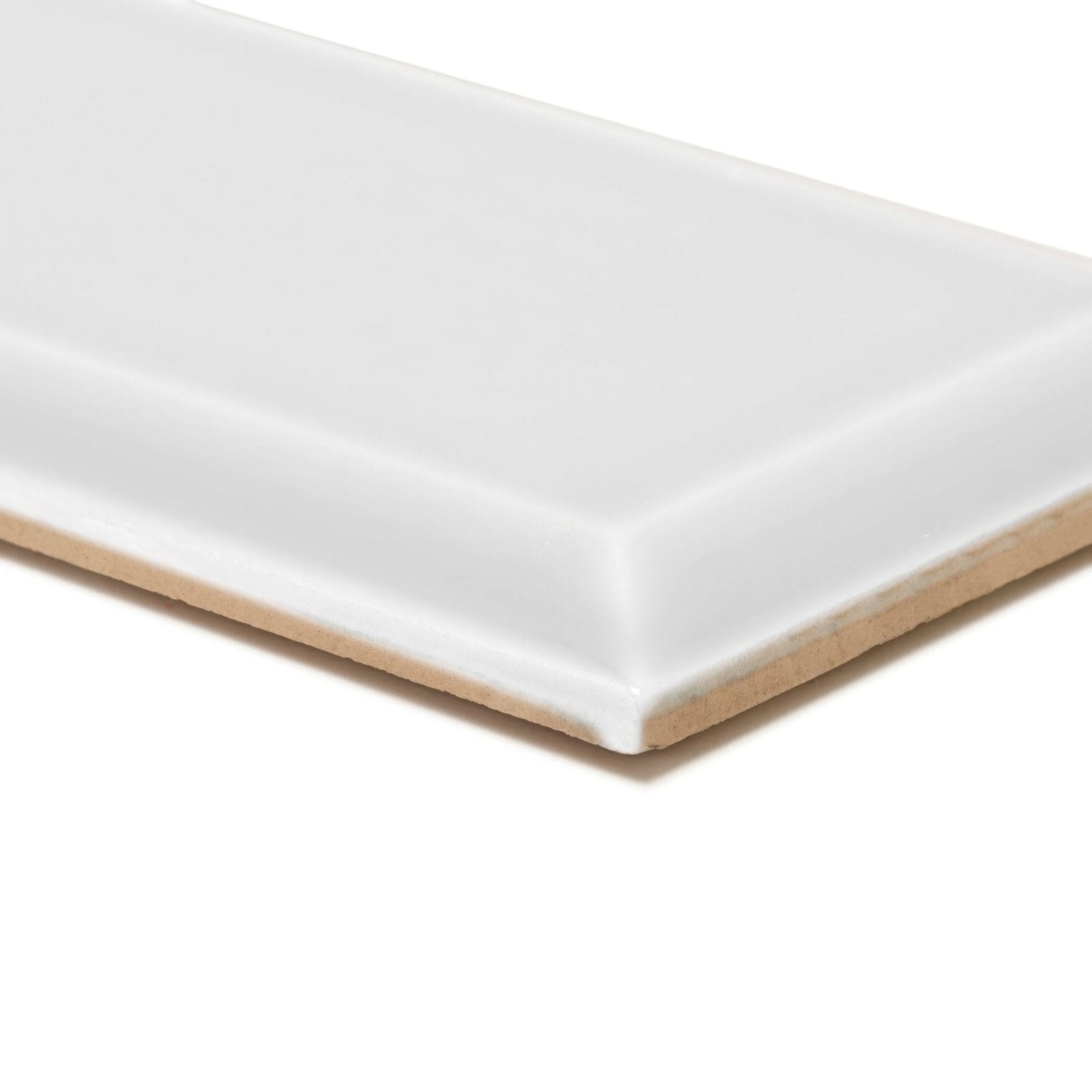 White rectangular ceramic metropolitan queensway glazed metro tile with glossy finish and beige backing shown from back side