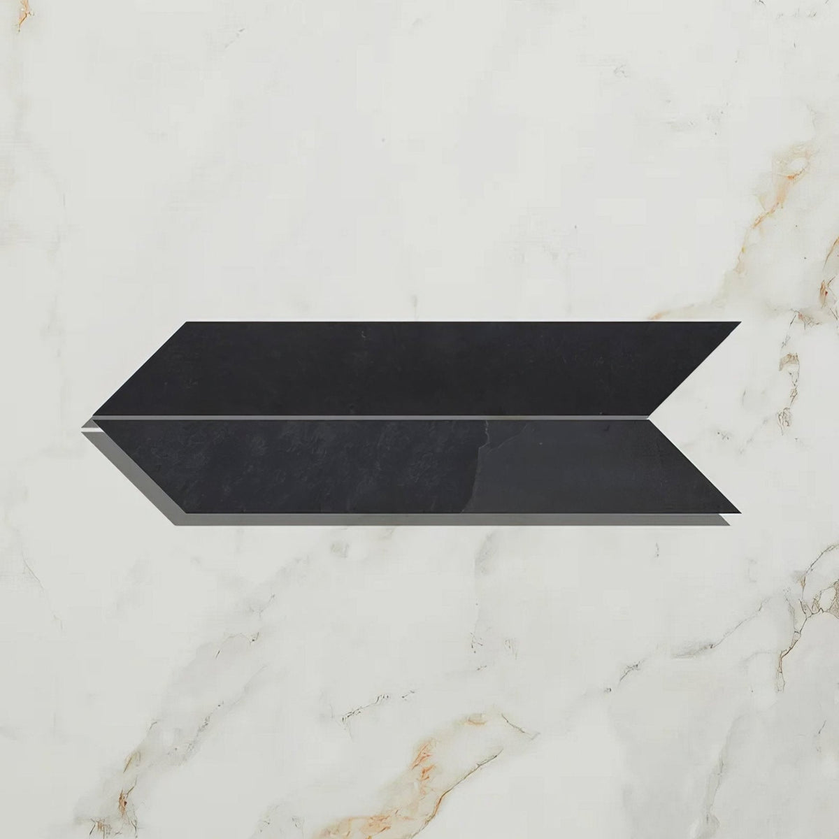 Black arrow-shaped metropolitan slate chevron tile with glossy riven finish on white marble background