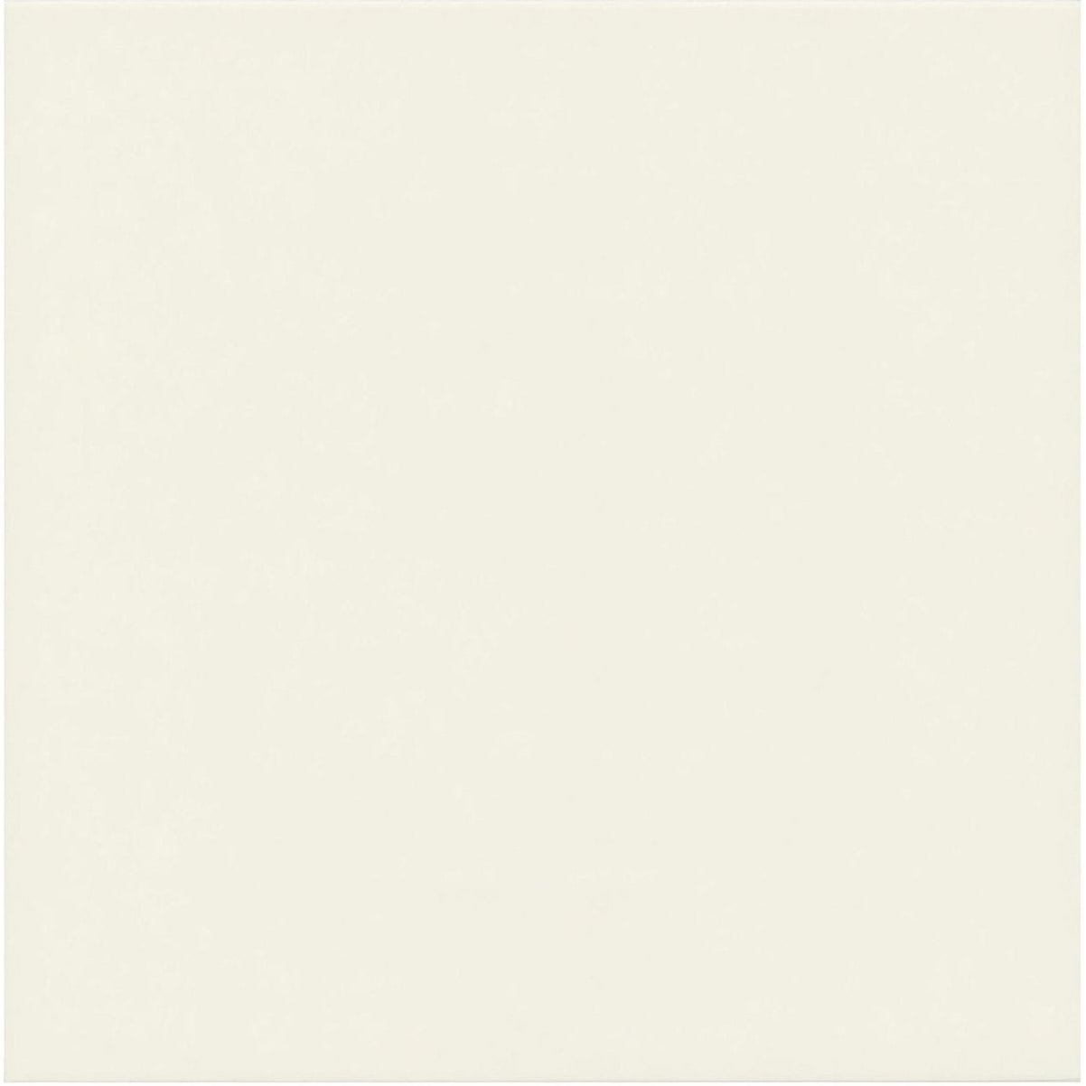 Cream-colored smooth-surfaced porcelain tile milan cerva white ideal for modern flooring and wall applications