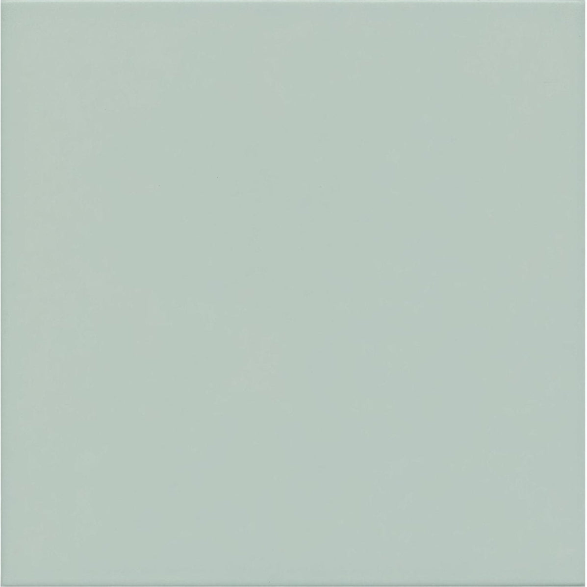 A smooth matte finished light green porcelain tile from milan gorani ideal for modern flooring and wall design