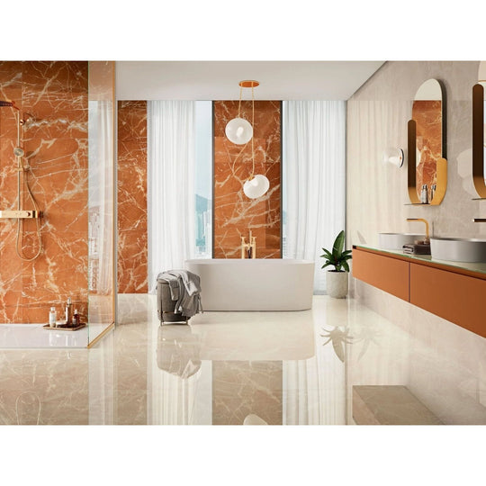 Mistral 1863 Crema Polished cream marble-effect tiles with a freestanding bathtub