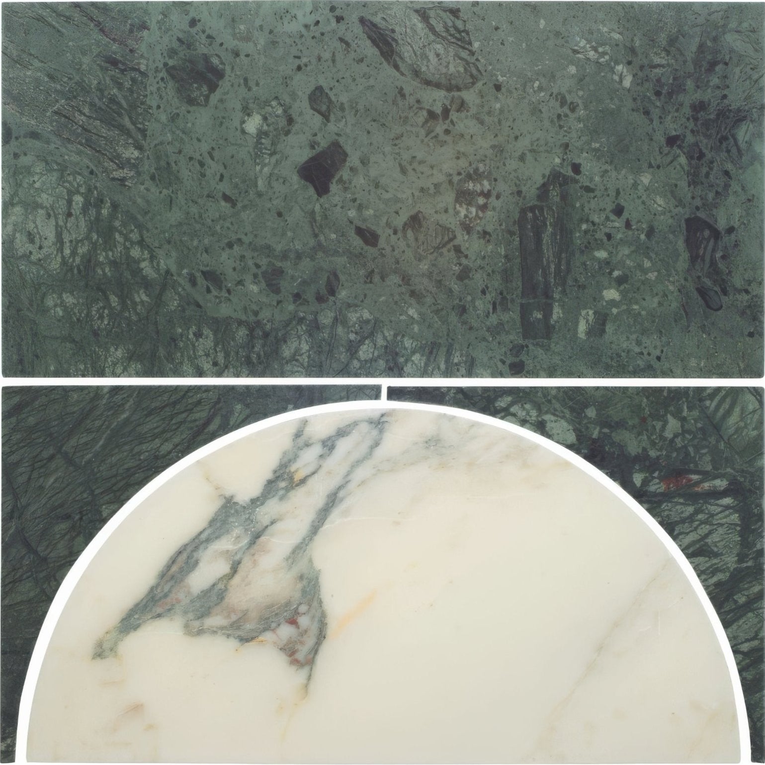 Monet Luna Verde dark green marble slab with speckled patterns and creamy white marble circular inset with gray veining
