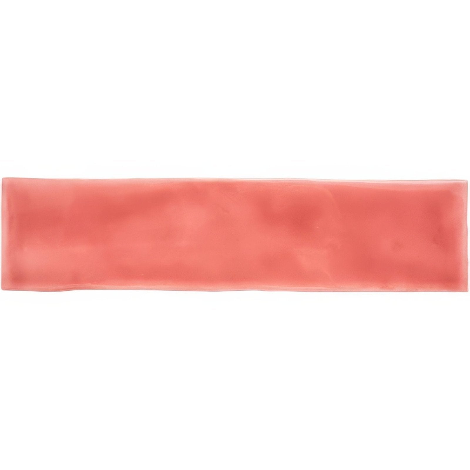 A rectangular coral-colored silicone headband with a smooth textured surface from musk large brick tile collection