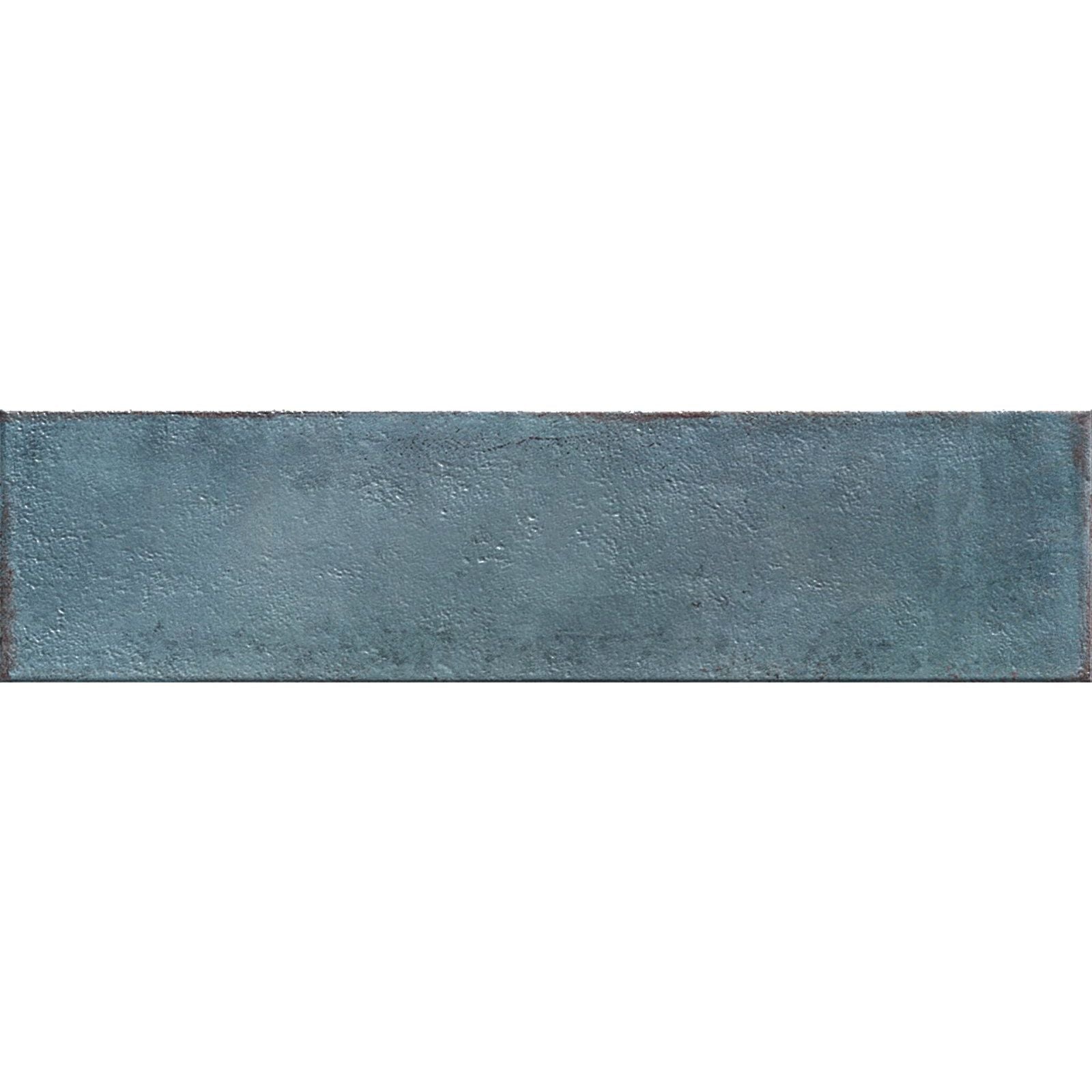 A rectangular teal ceramic tile with a textured matte finish from mussa blue brillo collection