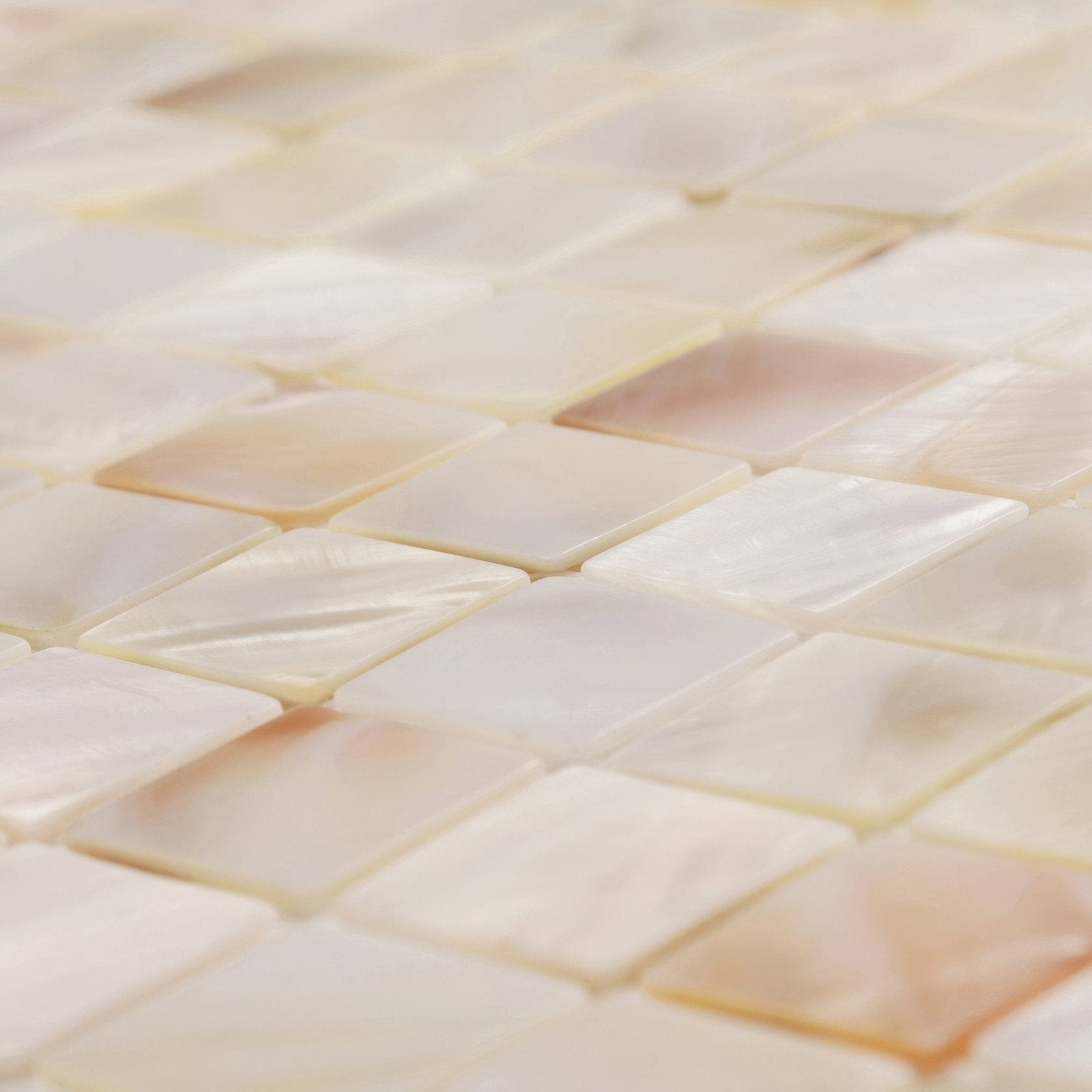 Natural 25mm square beige and cream-colored mother-of-pearl mosaic tiles with subtle iridescent sheen